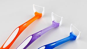 tooth flossing aid